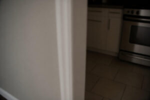 partial view of kitchen after fire damage taken while walking past doorway