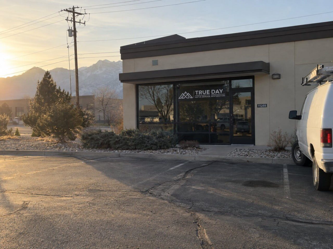 True Day Water Damage Restoration office exterior at 11268 S 2865 W in South Jordan, Utah, with visible True Day signage on the building